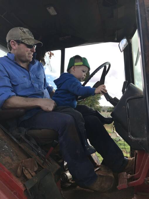 Helping my mate, my dad in the tractor. Photo: Lucas Dawson
