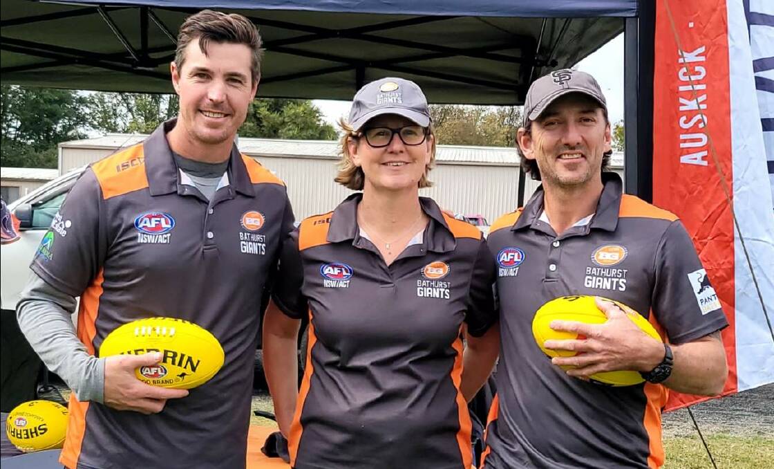 COUP: Former St Kilda star Lenny Hayes (left), pictured with Giants president Kath Sloan and James Leslie, will play for the Bathurst club this season. Picture: Supplied
