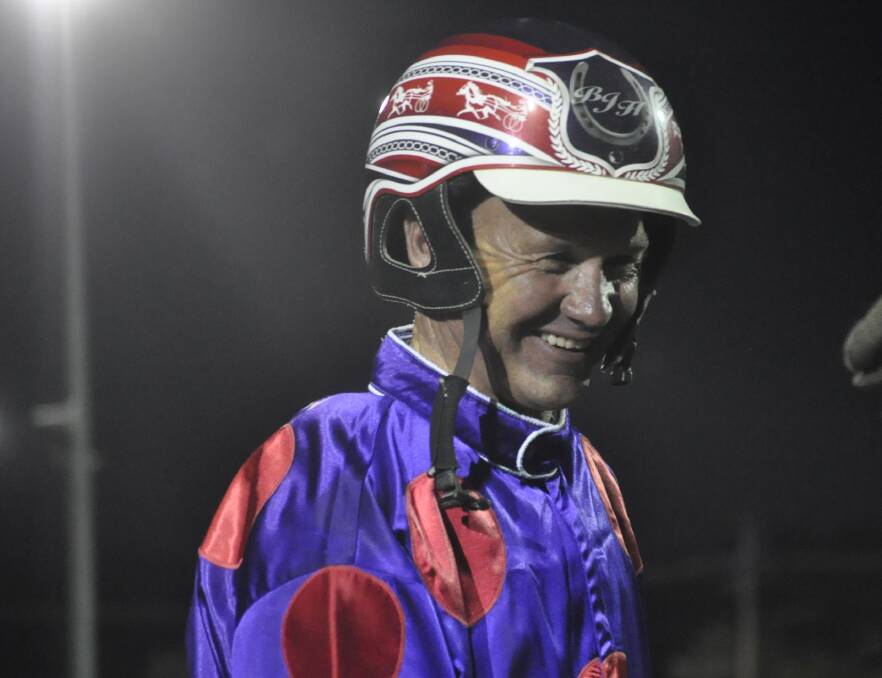 DELIGHTED: Bernie Hewitt was all smiles after Mackeral won the Cherry Festival Cup in Young on Friday night. Photo: PETER GUTHRIE