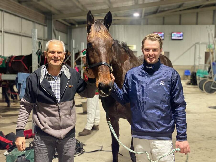 WAR HORSE: Trainer Peter Trevor-Jones and driver Tom Pay combined to land another win with 12-year-old Beetson. Photo: AMY REES