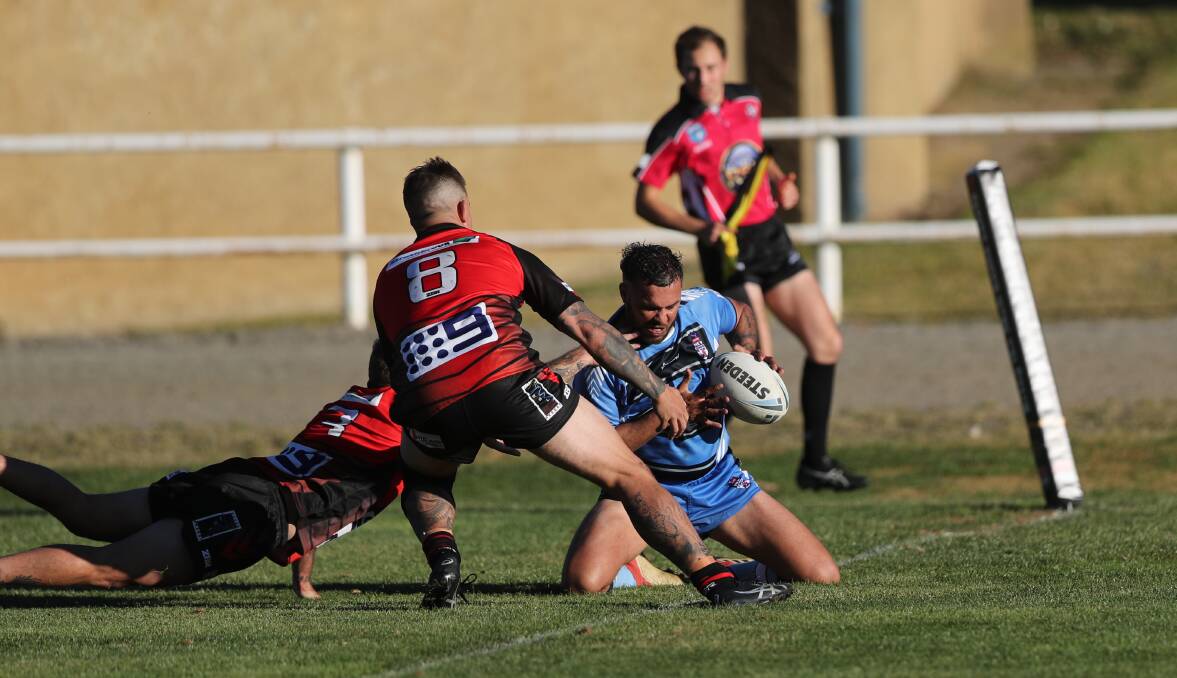 FOUR POINTER: Bathurst Panther talent and Group 10 centre Jeremy Gordon about to plant the ball for a try. Photo: PHIL BLATCH