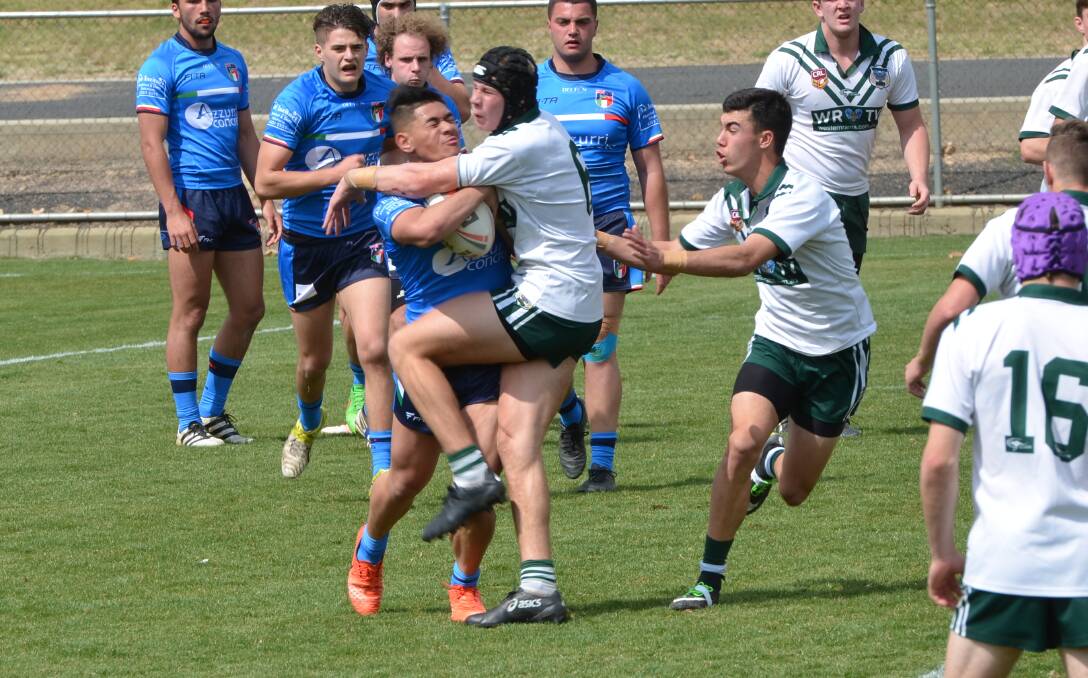 Matt Burton, with Charlie Stanies watching on, in action for the Western Rams in a 2017 match at Carrington Park. The duo have since gone on to impress in the NRL. Picture: Anya Whitelaw