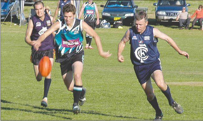 GO DOWN IN FAME: Cowra's Geoff Day (right) is already an AFL Central West life member, but will he be inducted into the new hall of fame? 