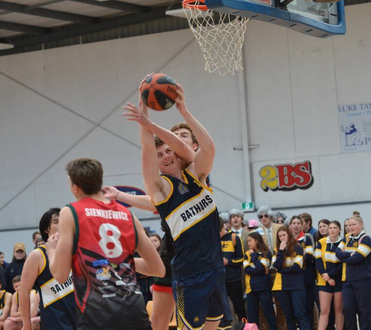 THRILLER: Bathurst High and Dubbo Senior College played out a 34-all draw in their Astley Cup basketball game. Photos: ANYA WHITELAW