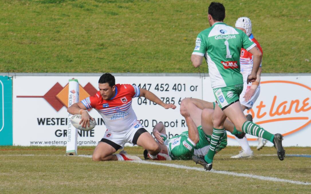 Corin Smith crosses for the Mudgee Dragons against Dubbo CYMS earlier this season. His side has been piling up the points in the Peter McDonald Premiership. Picture: Nick Guthrie