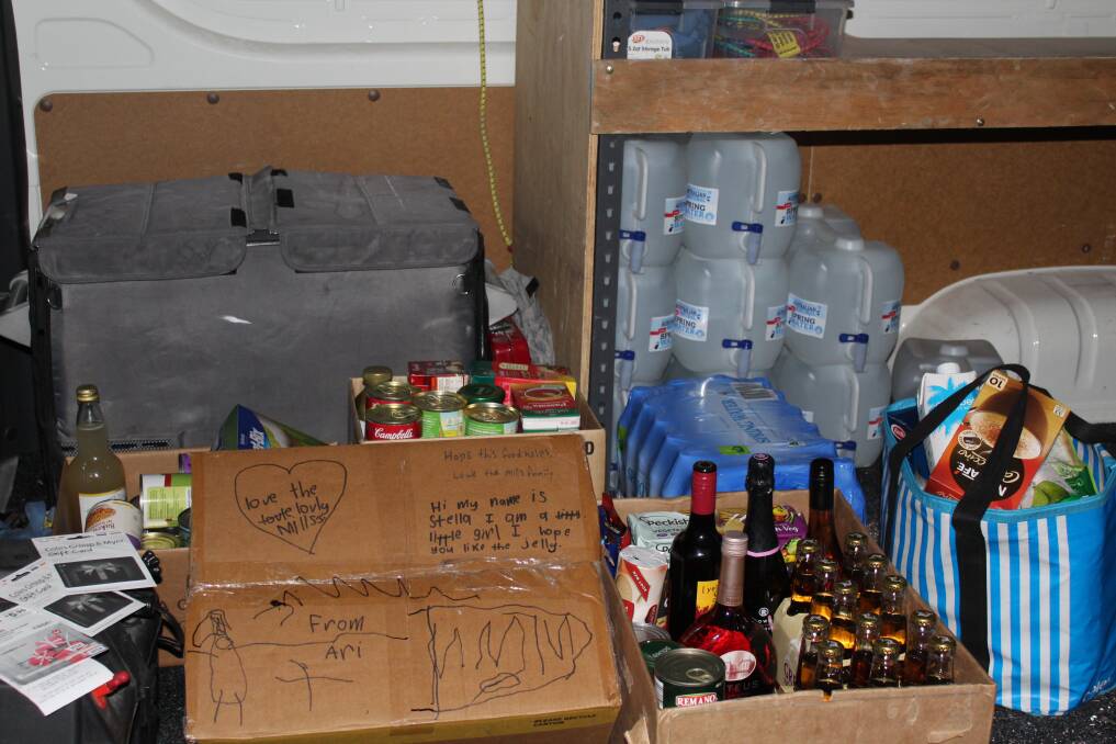 DONATIONS: A wide range of items, mainly groceries, have been donated including bottled water.