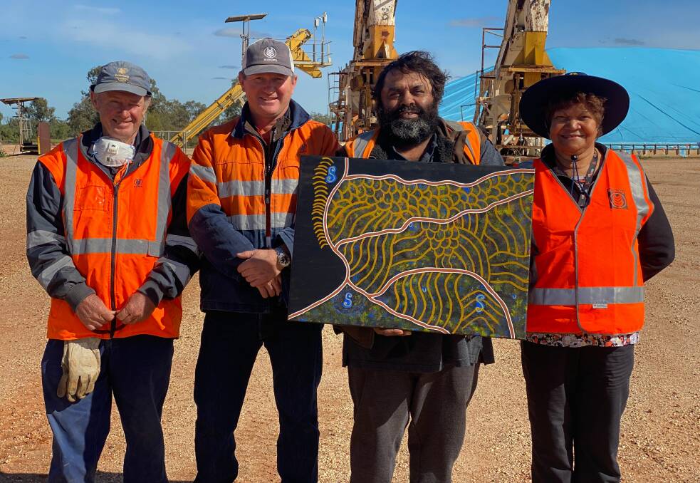 GrainCorp Walgett site manager Barry Smith, GrainCorp Burren Junction area manager Tim Renaud, artist Darryl Ferguson and Gamilaroi Elder Doreen Peters show off one of the murals. Photo: Ali Smith 
