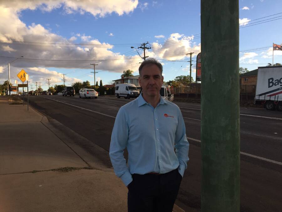 CONCERNED: Rod Webster out the front of his business as a ute drives in. He says this will not be possible under an RMS proposal.