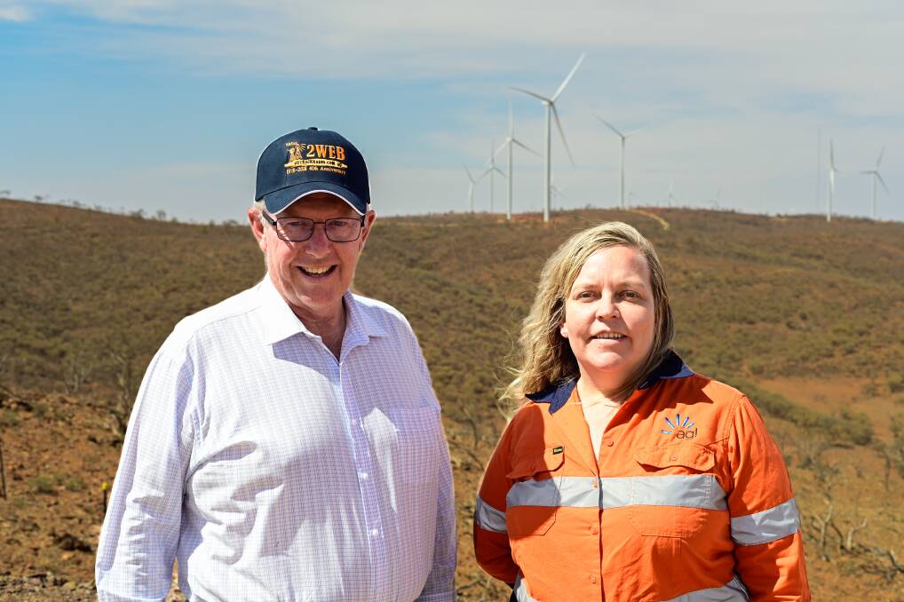 CLEAN AND GREEN: Federal Member for Parkes Mark Coulton with AGL community relations manager Mieka White at the organisation's Silverton wind farm. Photo: SUPPLIED