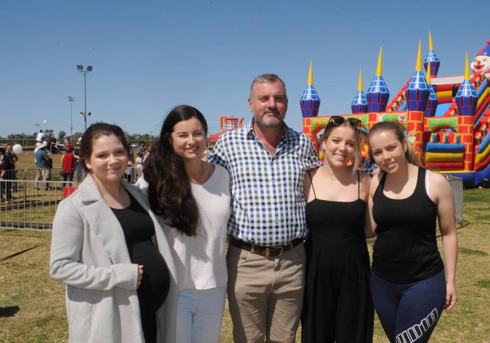 FAMILY EVENT: Courtney Hull, Nicole and Jason Yelverton with Jessica and Ashleigh Hull at Uniting's 10th annual Dads for Kids festival in Dubbo on Sunday. Photo: RYAN YOUNG