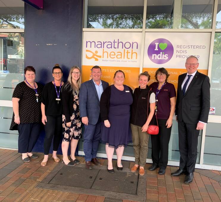 HAPPY SNAP: State Member for Dubbo Dugald Saunders and Families Minister Gareth Ward with Marathon Health staff on Friday. Photo: CONTRIBUTED