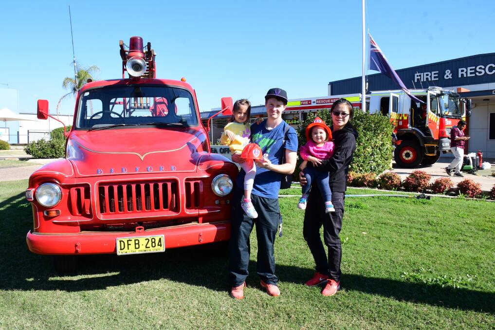 FUN DAY: Alysa, Adam and Alina Cuskelly with Avril Liv at the Fire and Rescue NSW open day in Dubbo on Saturday. Photo: AMY MCINTYRE