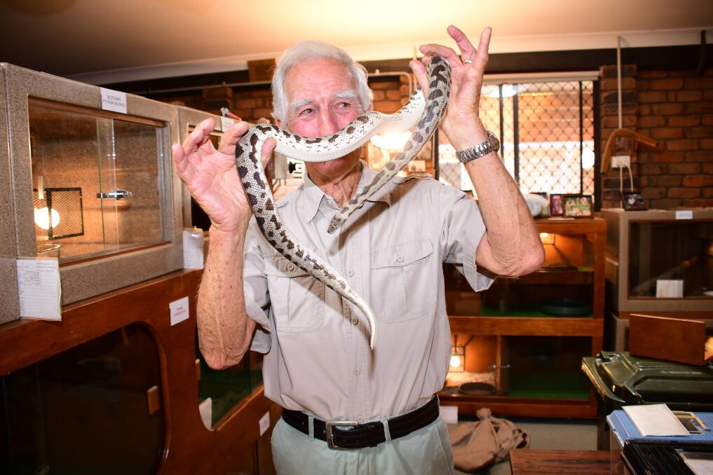 SNAKE LOVER: Paul Kirk shows off one his slithering friends. Photo: AMY McINTYRE