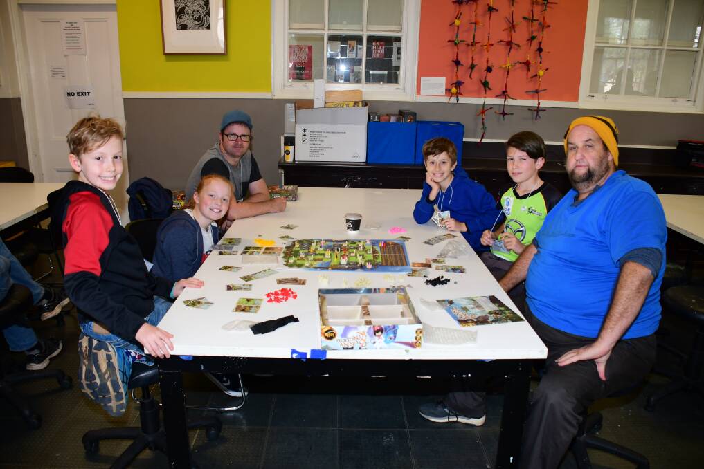 WEEKEND FUN: Noah Randell, Emelia Hosking, Tim Hosking, Finn Randell, Zachary Root and Alan Quin playing a game together at DubCon.