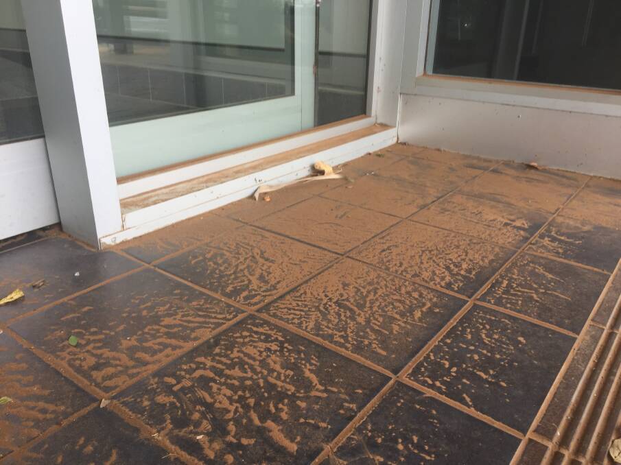 CLEAN NEEDED: Dust outside the Daily Liberal office. Photo: RYAN YOUNG