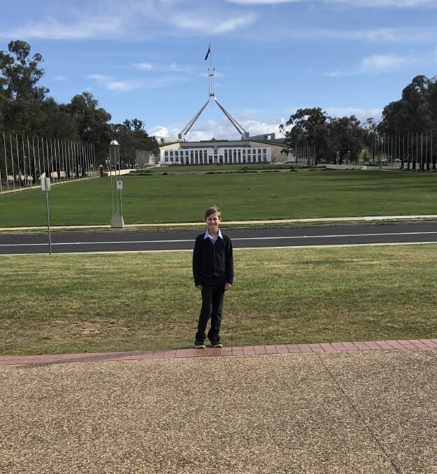 YOUNG TALENT: Finn Randell in front of Parliament House in Canberra. Photo: CONTRIBUTED