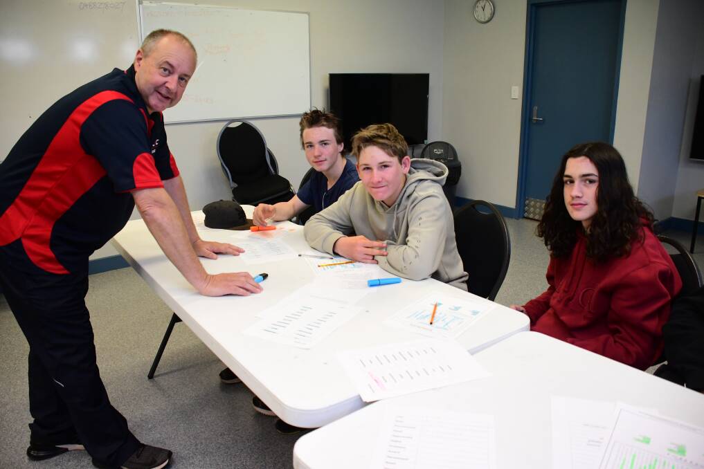 ACKNOWLEDGING ABILITIES: Fit for work program participants realising the benefits of work. Photo: BELINDA SOOLE