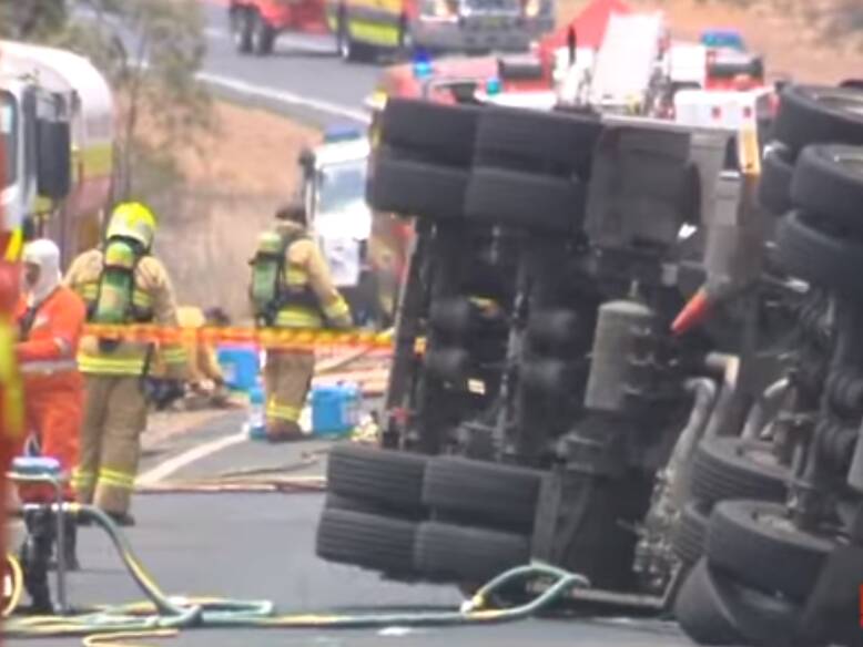 LUCKY ESCAPE: Emergency services crews at the Golden Highway incident scene on Monday. Photo: PRIME7 LOCAL NEWS