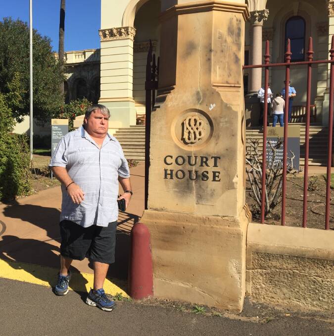 NOT GUILTY PLEAS: Robert Crockford leaves court in Dubbo on Friday. Photo: RYAN YOUNG