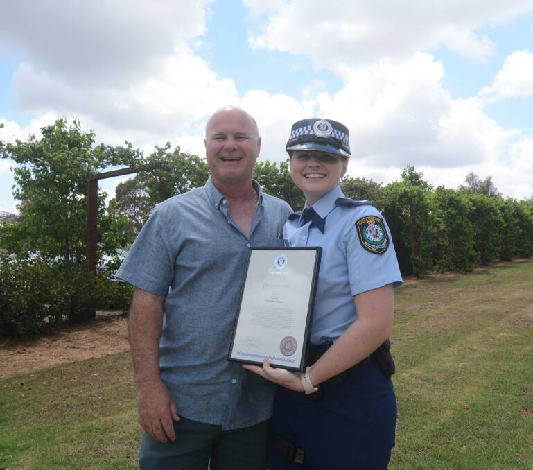 PROUD DAD: Russell Dwyer with his daughter Constable Alexandra Dwyer, who moved to the Central West from Sydney to start her policing career. Photo: RYAN YOUNG