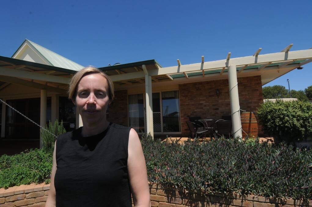 WORRIED: Lucy Cook outside her home. "In countless homes across NSW, kids share bedrooms through a mix of single and bunk beds with no issue - so why is this suddenly OK in the family home but not during a holiday?," Derek Noland from Airbnb says. Photo: RYAN YOUNG