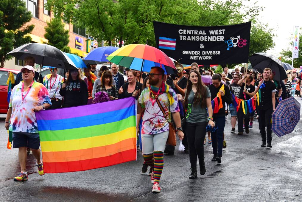 DUBBO DRAWCARD: People travelling down Macquarie Street during the inaugural Central West Pride March in 2015. Photo: BROOK KELLEHEAR-SMITH