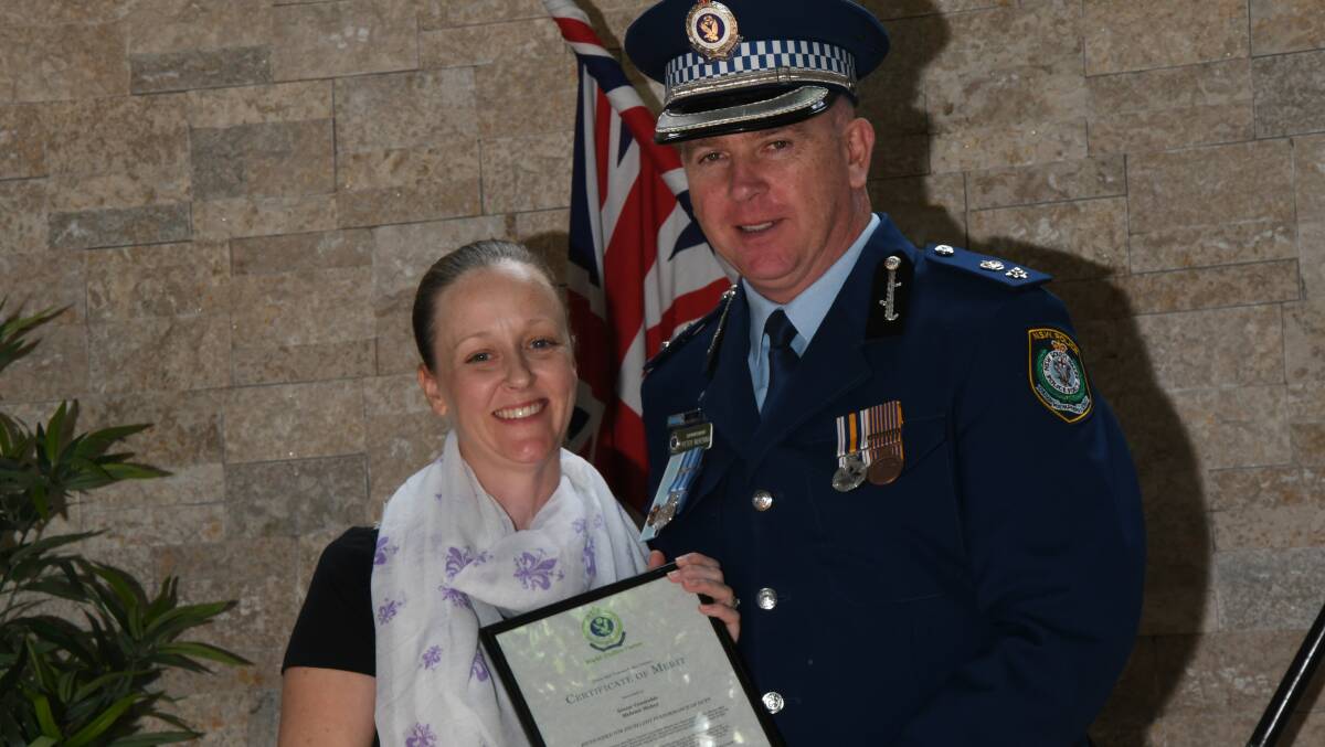 SUPPORTING YOUTH: Senior Constable Melanie Maher's achievements were recognised by Superintendent Peter McKenna. Photos: Contributed