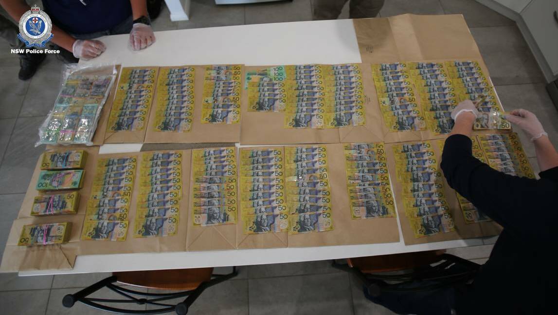DRUG BUST: Cash seized by police who were investigating the group of alleged drug dealers in March. Photo: NSW POLICE