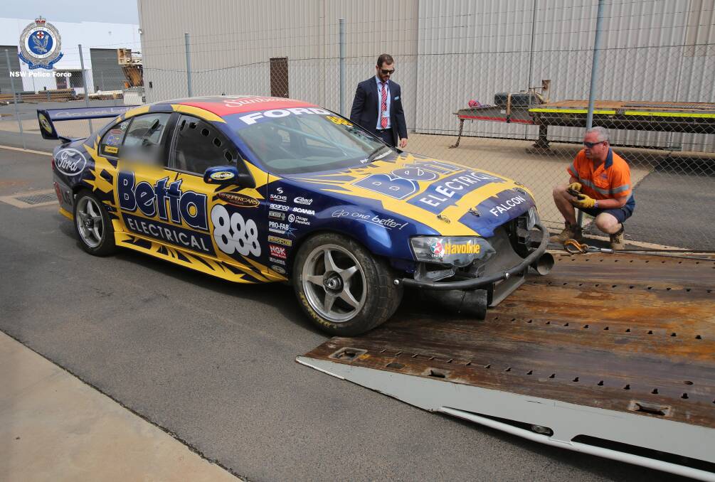 SEIZED: A V8 supercar police seized from Pro-Fab Smash Repairs on March 18. Photo: NSW Police