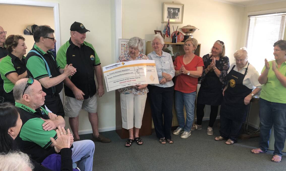 KINDNESS: CWA members receive a cheque from the Hills Ulysses Club. Photo: SUPPLIED