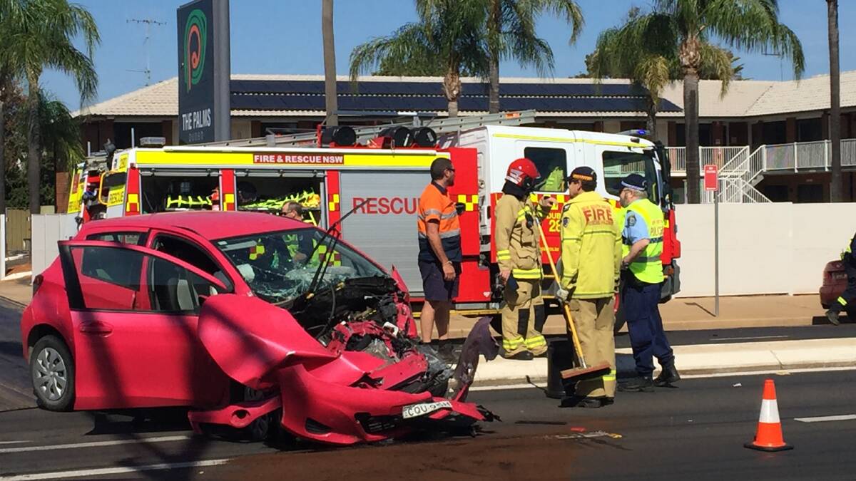 CAR DESTROYED: The scene of an accident on the corner of Brisbane and Cobra Streets in Dubbo on Friday morning. 