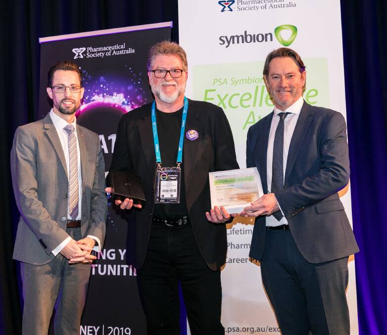 AMAZING ACCOLADE: The Pharmaceutical Society of Australia's national president Dr Chris Freeman, Peter Crothers and David Beaton from awards sponsor Symbion. 