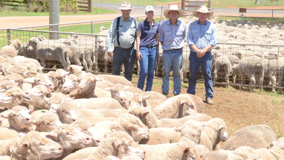 Merino ewes to lamb in march were purchased for a top of $190. Buyer Ronald Bowman, breeder Alison Kensit and agents Jamie and Angus Stuart.