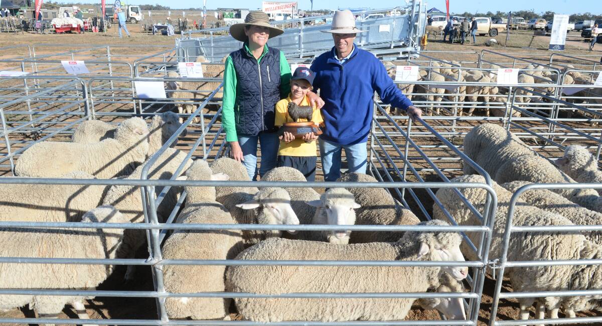 Dixie, Charles and Richard Stendell, Benavon, Brewarrina, with their pen of Kerin Poll/Anderson blood ewes which were the best short wool pen and overall winner from 13 teams shown in short and long wools.