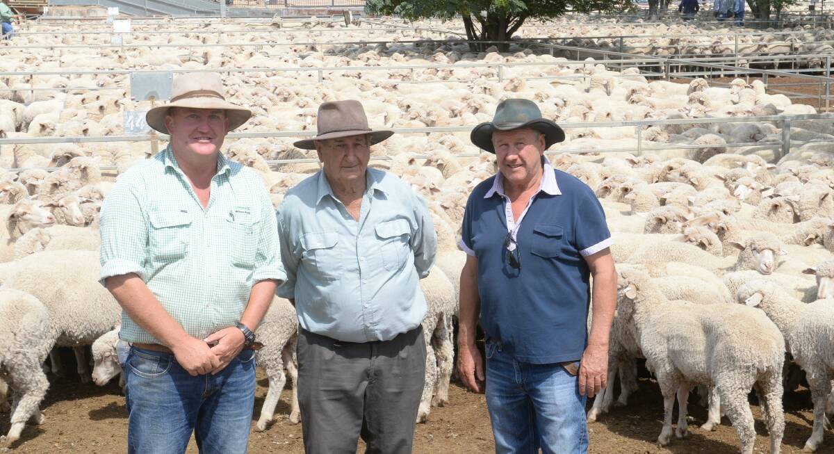 Landmark Wilson Russ agent Marcus Bruce with John Rae, who dispersed his Carwell Station flock and son, Greg, "YalYal", Kyalite who purchased some of his father's ewes.