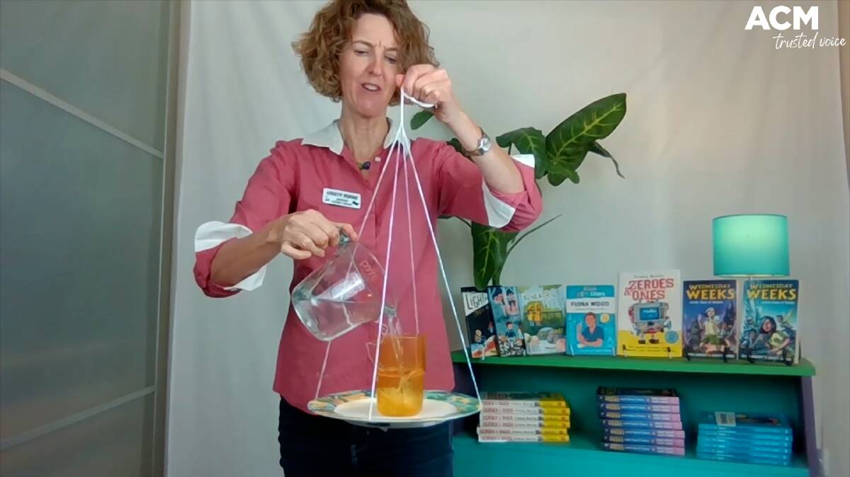 AT-HOME SCIENCE: Author Cristy Burne defies gravity with this simple experiment.
