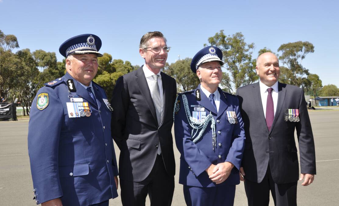 NEW CHAPTER: Deputy Commissioner Gary Worboys (left) called time on his 40-year career. He was with Premier Dominic Perrottet, retiring Commissioner Mick Fuller and Police and Emergency Services Minister David Elliott at Friday's attestation parade. Photo: Louise Thrower. 
