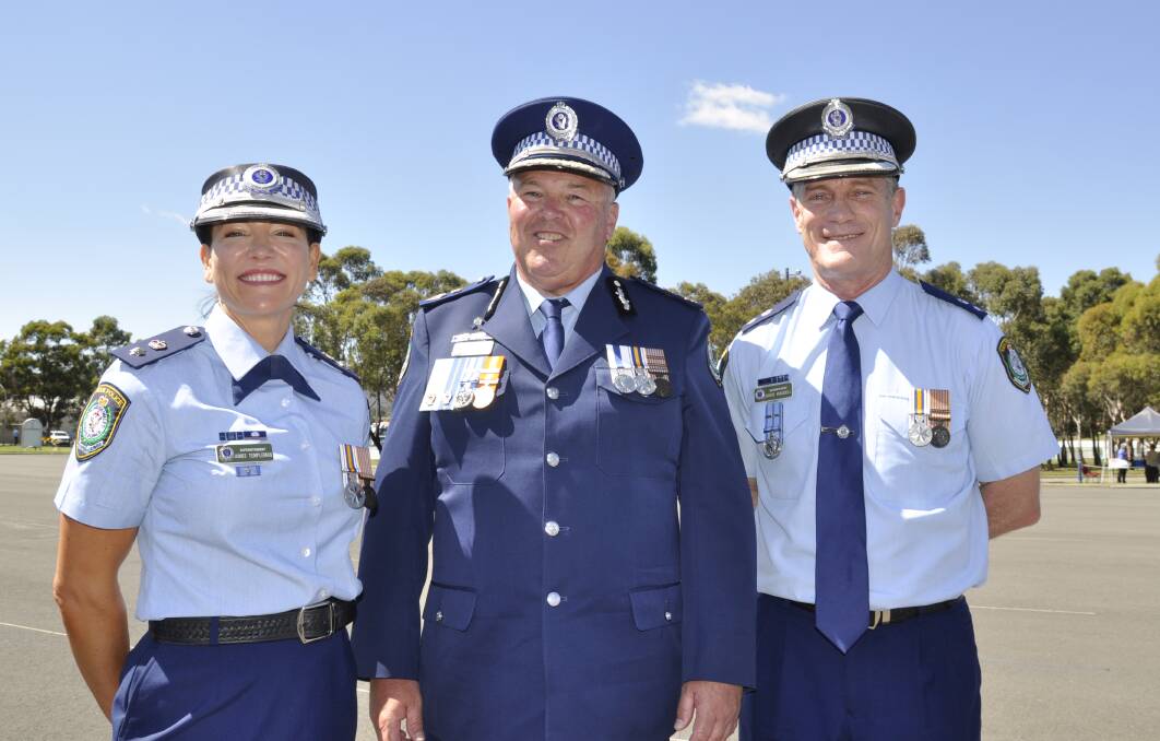 Deputy Commissioner Gary Worboys caught up with Superintendent Aimee Templeman and Superintendent David Waddell at Friday's attestation parade.