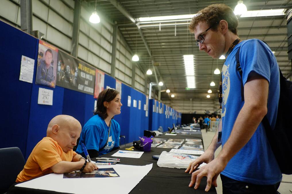 Verne Troyer signs autographs at Supanova in Melbourne in 2014. Picture: The Age