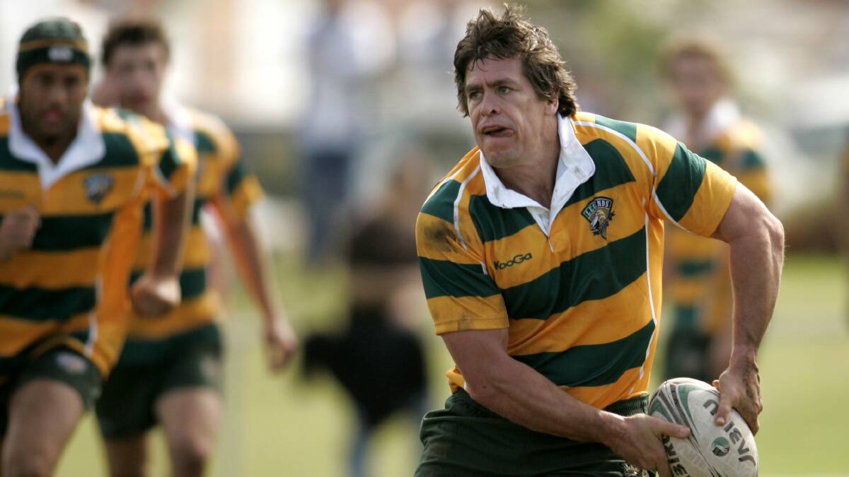 GIVING BACK: James Grant is a regular at these exhibition games, pictured here at a charity rugby day at St John Oval, Charlestown playing with a Legends side in 2009 at Newcastle. Photo: AAP
