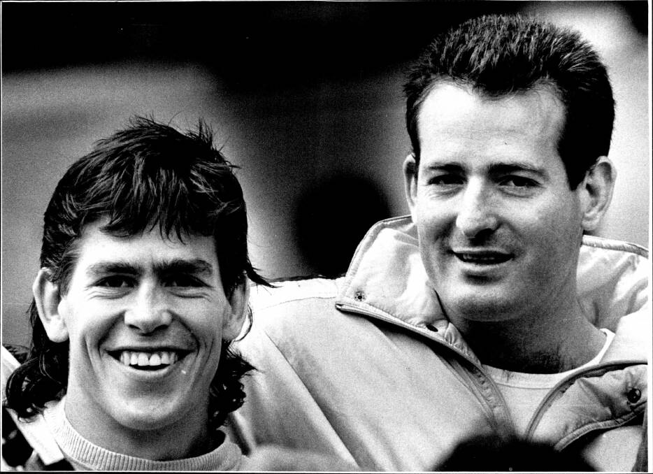 TURN BACK TIME: A young James Grant and Wallabies legend David Campese. Photo: AAP
