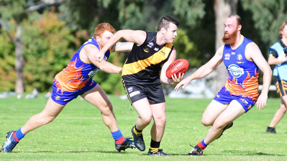 ON FIRE: Tigers halfback Chris Rothnie has been one of the black and golds' best so far this season. Photo: AMY McINTYRE