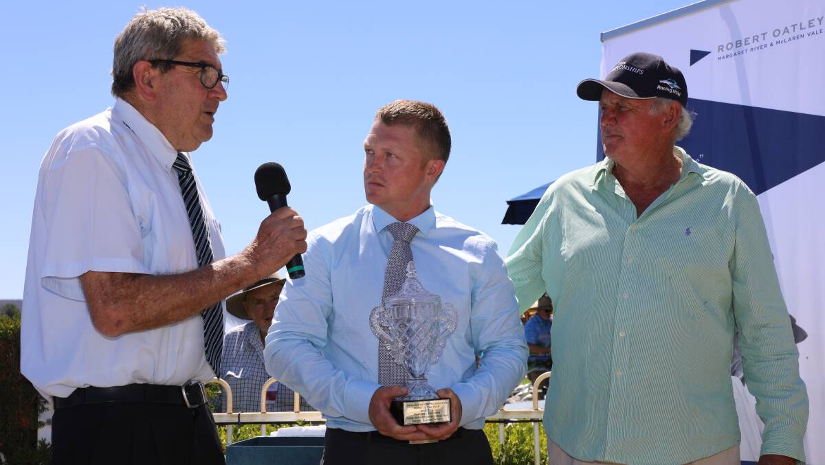 BEST OF THE BEST: Nictock trainer Cameron Crockett (centre) accepts the horse of the year award from CWRA secretariat Col Hodges. Photo: SIMONE KURTZ