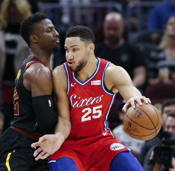 Philadelphia 76ers' Ben Simmons tries to drive against Cleveland Cavaliers' David Nwaba.