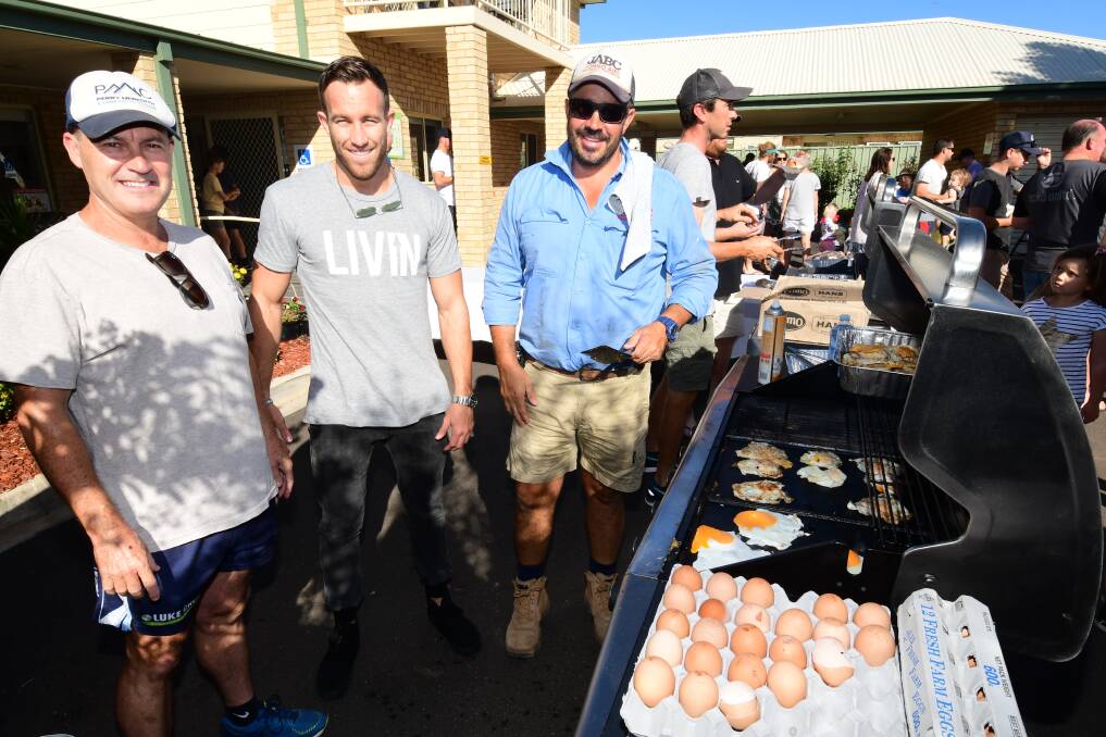 IMPORTANT MESSAGE: Mark Meredith, Sam Webb and Johno Aird at the tradies breakfast. Photo: BELINDA SOOLE