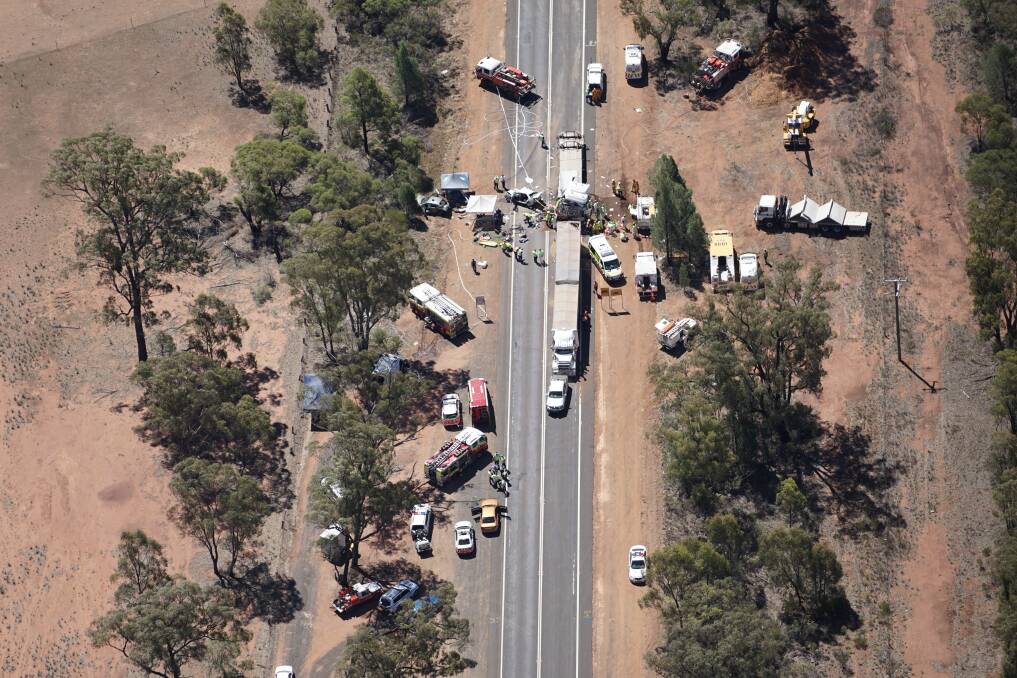 TRAGEDY: Emergency service crews at the scene of Tuesday's fatal accident near Dubbo. Photo: BRADLEY GUEST