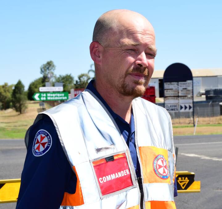 MEDICAL HELP: Chris Wilson from NSW Ambulance Service speaks with media at the traffic diversion site.