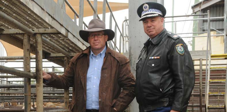 Western Region commander Geoff McKechnie (right) with police minister Troy Grant.