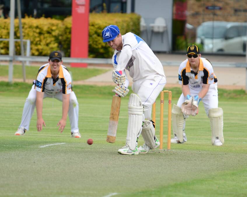 MED'S WAY: His bat has seen better days but it mattered for little as Daniel Medway made an unbeaten 142 for Macquarie on Saturday. Photo: BELINDA SOOLE