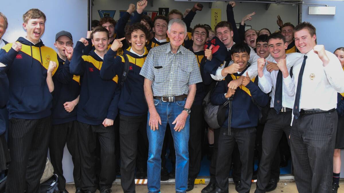 James Sheahan Catholic High School students with John Clarke on his last day of teaching. Picture by Carla Freedman